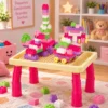 310156-1 Mesa Didática Infantil com 100 Peças Blocos de Montar e Figurinhas - Rosa