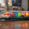977326EUR-1 Trem Transparente com Engrenagens